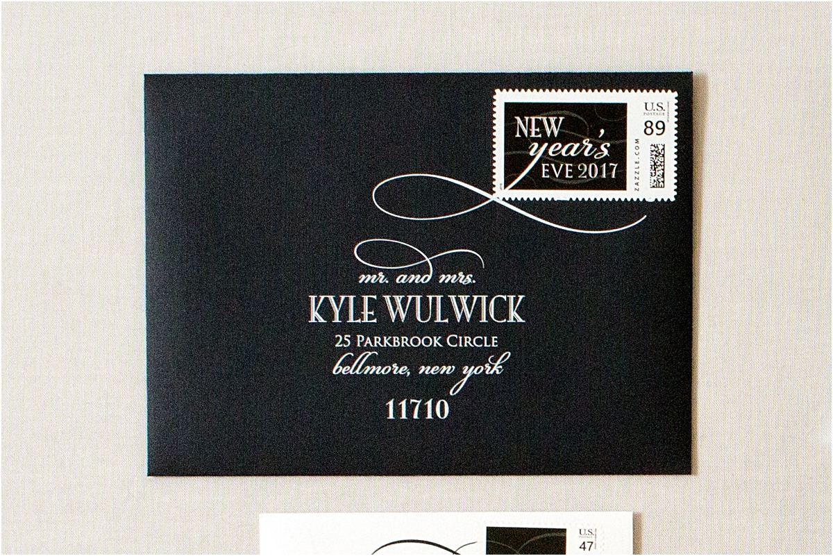 black envelope white address